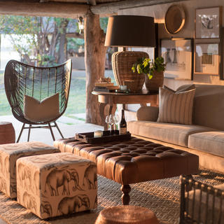 The lounge area evokes an atmosphere of a bygone safari era