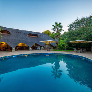 Central to the lodge is the large tear drop pool where guests are welcome to relax and enjoy themselves.