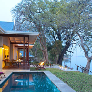 The lodge is situated on the northern bank of the Zambezi River, offering an exquisite view towards Mana Pools World Heritage site