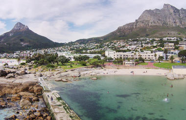 Camps Bay Village - Aerial view of Camps Bay, tidal pool and 12 Aspostles Mountain range
