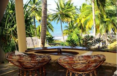 Kinasi Lounge overlooking the beach and swimming pool