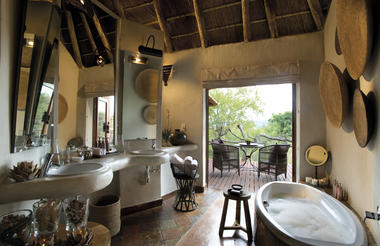 En-suite bathroom leading to outdoor shower
