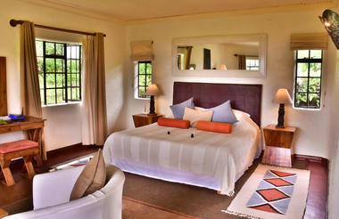 Cottage bedroom, Sabyinyo Silverback Lodge 