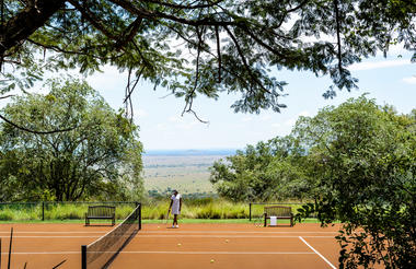 Termite clay tennis courts at Singita Sasakwa