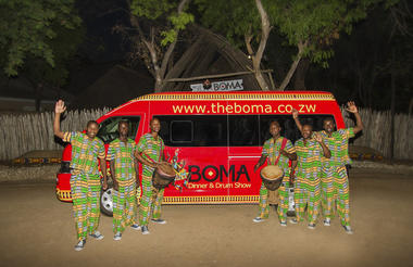 The Boma bus and the drummers at The Boma - Dinner & Drum Show