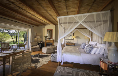 Each Karoo Suite is spacious with bedroom area and seating area with fireplace