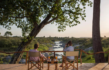 Rekero Camp - Guests enjoying views from the deck