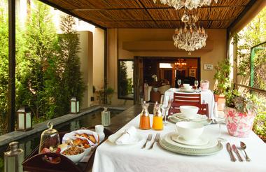 The Residence - full breakfast served on the terrace. 