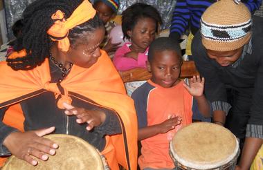 Drumming at Ella's house with Emzini Tours