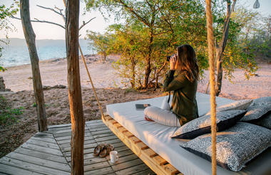 Relaxing on one of the secluded hanging beds in camp