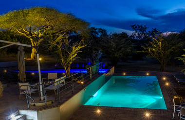 Pool after sunset Chobe Bush Lodge