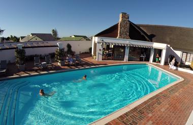 Kids swimming in solar heated pool