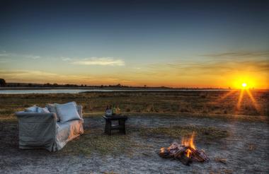 Enjoy the warmth of the fire while watching the sunset
