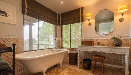 Bathroom with bath & shower