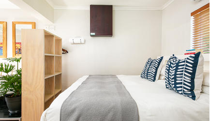 Village Apartments - Romantic Studio | Bedroom