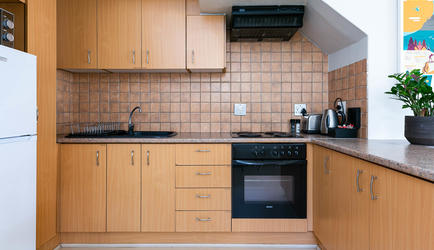 Village Apartments - 1 Bedroom Standard Apartment | Kitchen