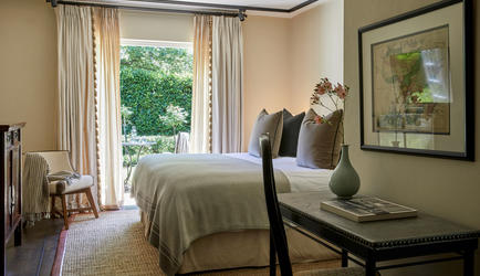 Bedroom opens out onto gardens