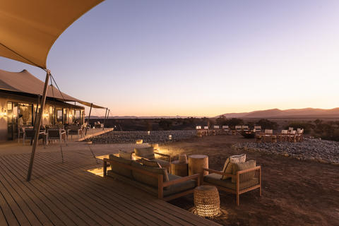 The comfortable and elegant main area lounge opens onto sweeping views of the Kulala Wilderness Reserve.