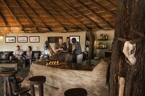 Enjoy shared stories in the camps comfortable bar, lounge and dining area