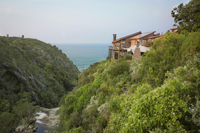 Perched above a spectacular 30m waterfall with stunning ocean views