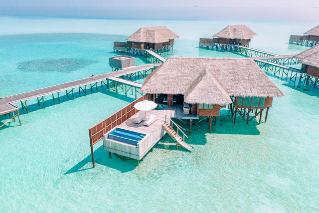 A romantic haven on stilts above the azure waters. This water villa is ideal for couples wanting to sunbathe in the infinity plunge pool while watching the breathtaking Maldivian sunset or descend from the sundeck steps and swim with exotic reef fish on the crystal clear lagoon.