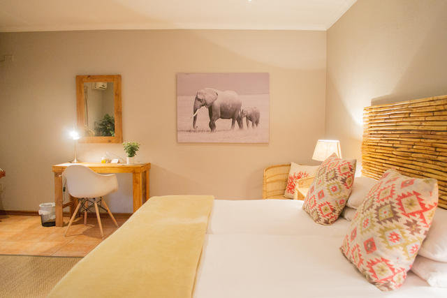 Unsere schönen Safari-Suiten im Safari-Stil bieten Platz für 2, 3 oder 4 Personen
