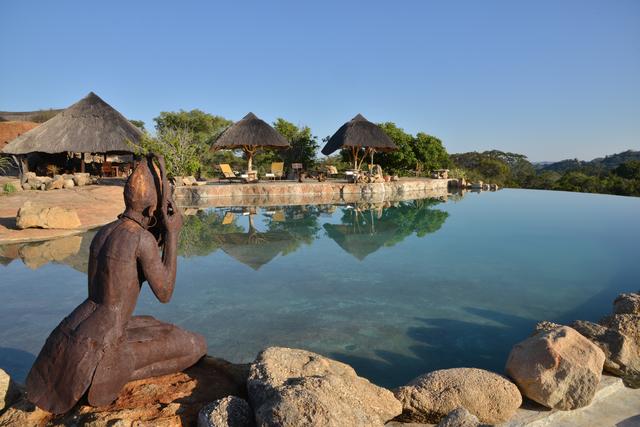 The beautiful infinity pool, carved into the granite rock offers you the opportunity to relax & refresh in its cool waters or on the comfortable sunbeds, with breathtaking views over the Matobo Hills and the waterhole below.  Situated next to the sunset lounge, which holds the safari spa where guests can pamper themselves with a range of treatments from full body massages to facials, pedicures & manicures.