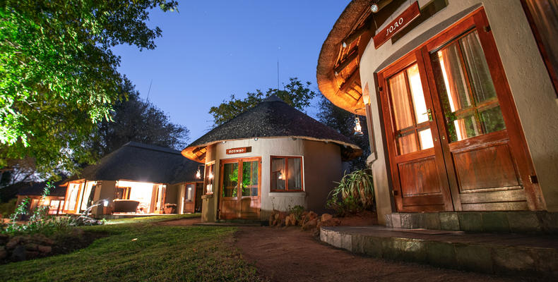 Exterior of Luxury Safari Rondavels and indoor lodge area