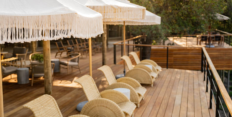 Deck seating overlooking riverbed 