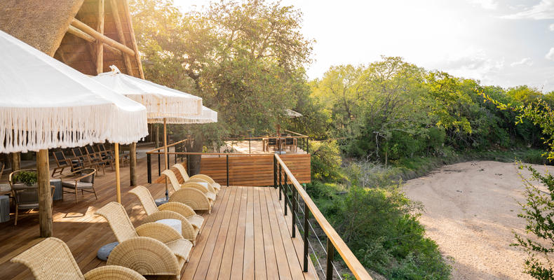 Deck seating overlooking riverbed 