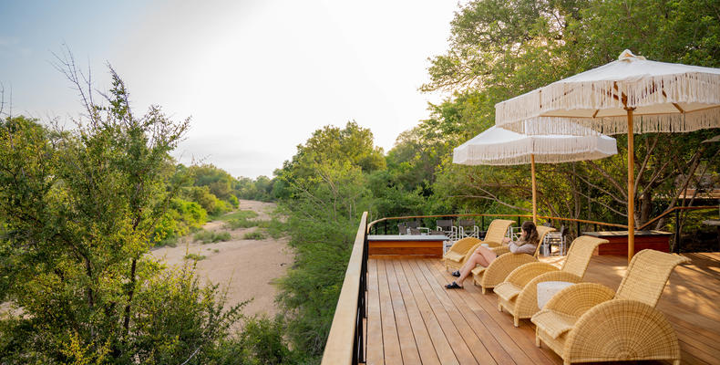 Deck seating overlooking riverbed 