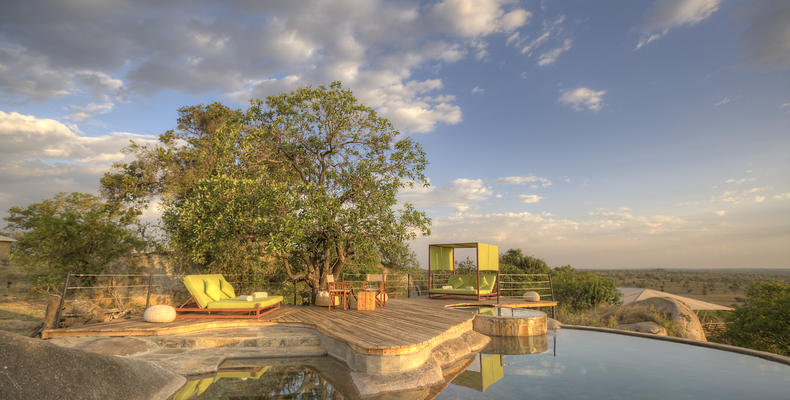 the unique rock pool overlooking the Serengeti plains