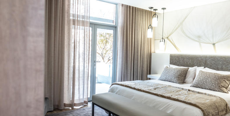 Ground floor Luxury suite leads out to a private patio and garden