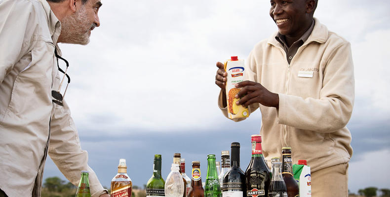 Olakira Camp - Guest enjoying sundowners