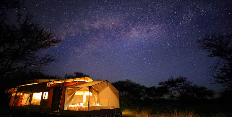 Olakira Camp - Watching the milky way at night from the stargazing tent