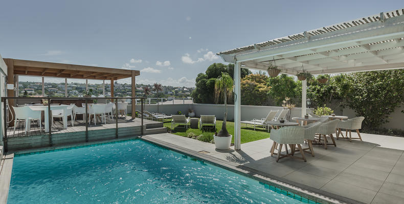 The Robberg Beach Lodge - Pool Outside Dining Area