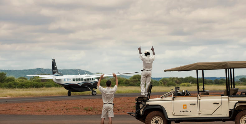 Morukuru Family Madikwe - waving our guests goodbye at Madikwe East airstrip