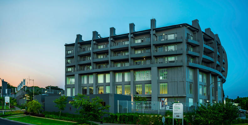 Genesis All- Suite Hotel