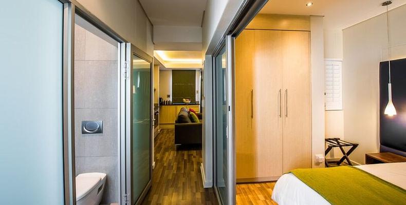 Genesis All- Suite Hotel