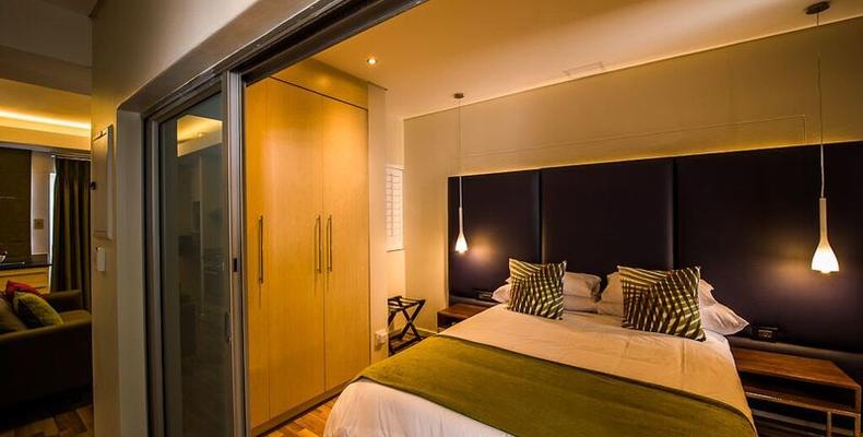 Genesis All- Suite Hotel