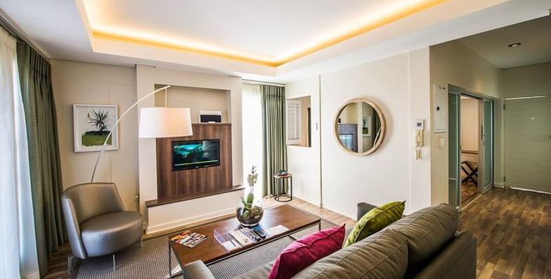 Genesis All- Suite Hotel