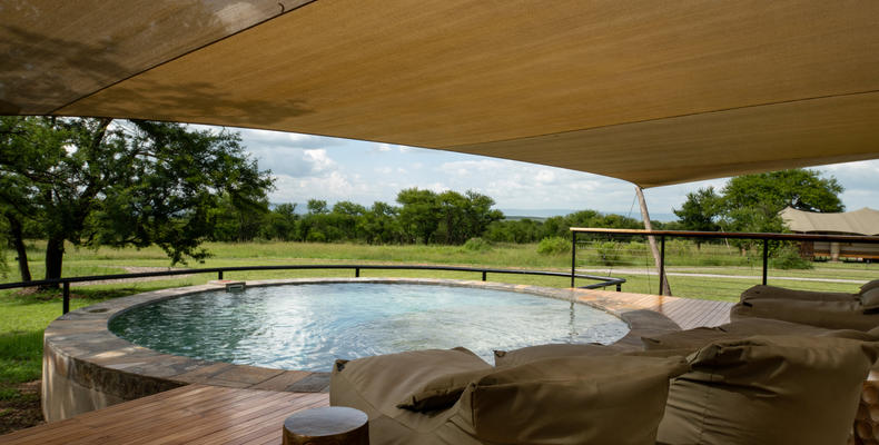 Asilia Africa - Sayari Retreat - Loungers at Swimming Pool in shared Main Area