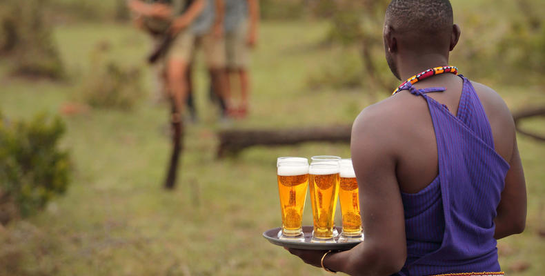 Kokoko - Friendly Staff Welcoming Guests With a Cold Drink