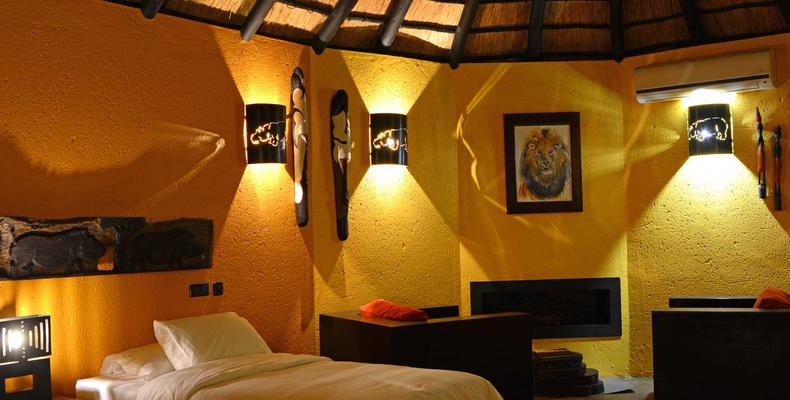 Twin bedroom interior with fireplace