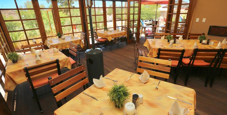 Enclosed dining area on patio