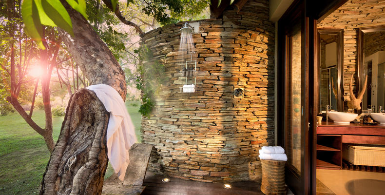 Luxury Pool Suite and Luxury Suite outdoor shower