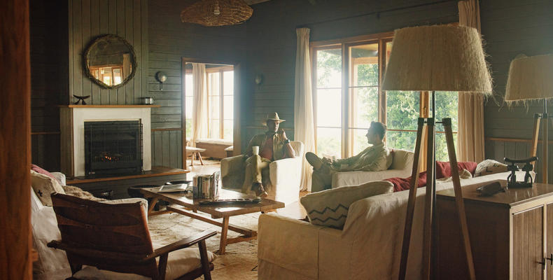 Morning coffee, and conversation, in one of the two sitting rooms at the Entamanu mess