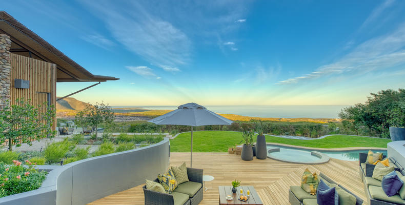 Garden Lodge outside area with pool