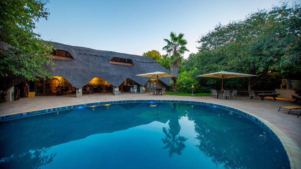 Central to the lodge is the large tear drop pool where guests are welcome to relax and enjoy themselves.