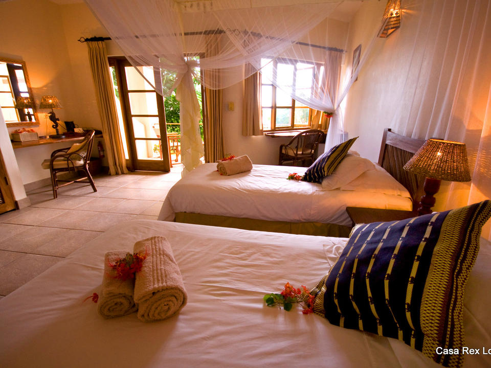 The downstairs Acacia bedrooms are all twins and facing the pool
